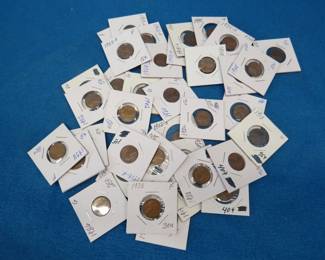 Lot 118. 39 sleeved Lincoln wheat pennies. Dates range from 1917-1958.
