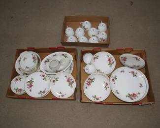 Lot 387. Three flats of Sango Moss Rose china. Too much to spread out.