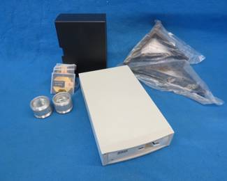 Lot 332. Nikon Coolscan, Ikea brackets, Discgear storage box and lenses