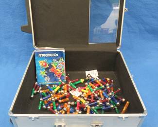 Lot 51. Magnetix magnet building components. Includes rolling aluminum case.