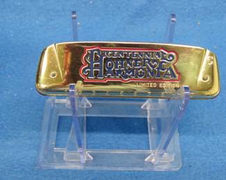 Lot 126. Hohner Bi-Centennial diatonic harmonica in the key of C. Harp and box in excellent condition.