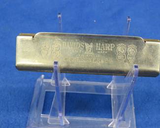 Lot 78. Messner's Rival Band 10-hole octave harmonica in the key of E. Sounds great.