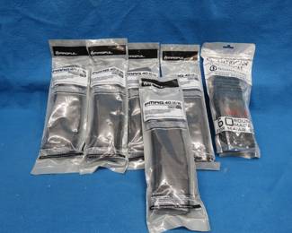 Lot 178. 5 Magpul 40 AR/M4 magazines. 1 American Tactical 60-round magazine.