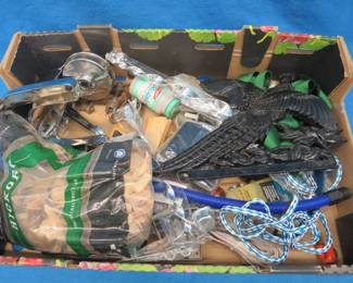 Lot 131. Vintage citrus squeezer, metal pheasant wall plaque, hickory smoking chips, and more.