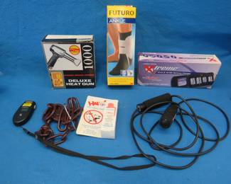 Lot 233. Heat gun, Ni-Cd battery charger, jump rope, and more