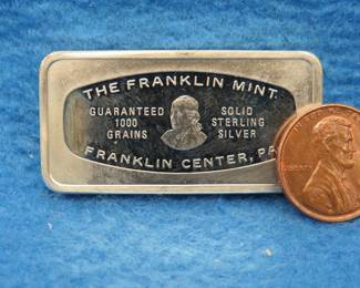 Lot 374. Franklin Mint Bank-marked sterling silver ingot. 65.5 grams.
