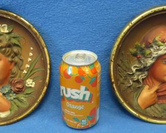 Lot 207. Two cast iron Bradley and Hubbard hanging wall plaques. #1810 and #1811.
