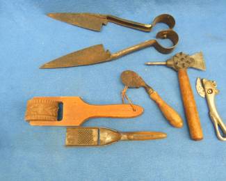Lot 384. Antique kitchen tools including an ice shaper, animal head can opener, and more