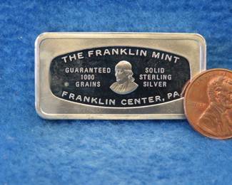 Lot 162. Franklin Mint Bank-marked sterling silver ingot. 65.4 grams.