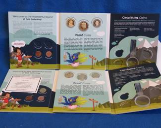 Lot 305. Two Explore and Discover 2019 coin sets with 2019 dollar, half-dollar, and quarter