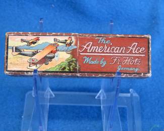 Lot 282. Fr. Holz The American Ace ten-hole diatonic harmonica in the key of F in a cardboard 2-piece box in excellent condition.
