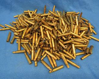 Lot 112. Approx. 300 spent 30-30 brass with no primers. Ready for reloading.