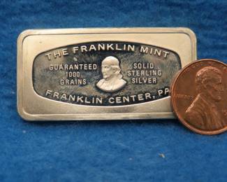 Lot 376. Franklin Mint Bank-marked sterling silver ingot. 65.6 grams.