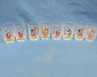 Lot 231. Eight McDonald's Disney glass mugs from the year 2000