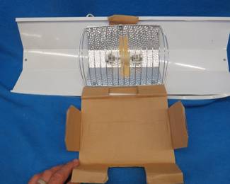 Lot 216. Terrarium heat lamp. Damaged as pictured.
