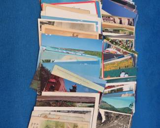 Lot 291. Old postcards including location cards and holiday and souvenir postcards. Some are over 100 years old.