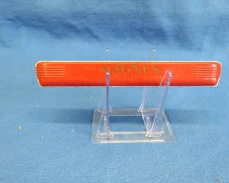 Lot 204. Magnus Duo-Tone plastic toy diatonic harmonica in the keys of C&B. Sounds great.