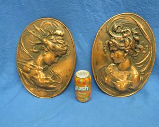 Lot 123. Pair of cast iron wall plaques. 13.5" x 10".