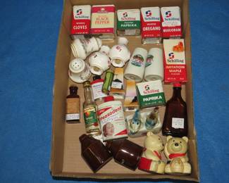 Lot 276. Vintage tins, salt and peppers, and old bottles