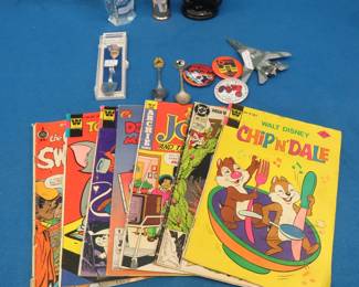 Lot 32. Comic books, perfume containers, pinbacks, and more