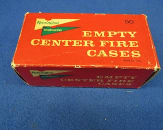 Lot 315. Fifty 30 Carbine rounds in a vintage Remington empty cases box