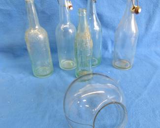 Lot 183. Antique Glass bottles and a glass globe?