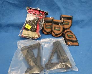 Lot 180. Accessory pouches. MagPul stock. Safari Lane holster.