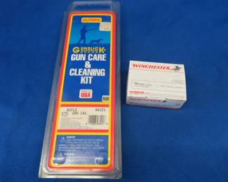 Lot 310. 100 Winchester 9mm rounds and a gun cleaning kit