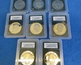 Lot 343. Eight 1973-1978 encapsulated Eisenhower dollar coins. INB certified MS70 or clad proof PR70