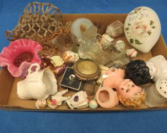 Lot 38. Collectible mix including a china doll head, Scottie candy container, pink hobnail vase, and more