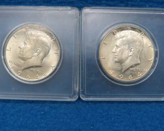 Lot 57. Two 1964 P Kennedy silver half dollars