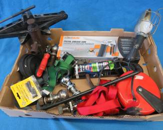 Lot 188. Receiver hitch, hitch balls, retractable light, auto jacks, grease gun, and more