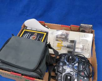 Lot 108. Air brush holder, Polaroid film plates, bike seat, and more