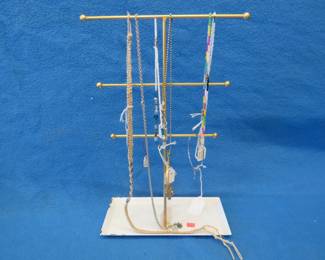 Lot 292. Jewelry stand with jewelry