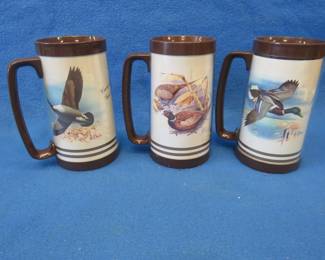 Lot 325. Three Les Kouba Thermo-Serv thermal mugs