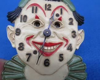 Lot 122. Lux wind-up eye movement clock for parts or repair