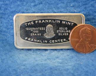 Lot 161. Franklin Mint Bank-marked sterling silver ingot. 65.4 grams.