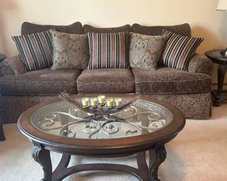 High end sofa with glass top coffe table and matching end tables 