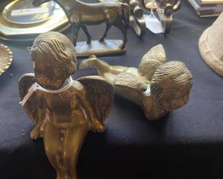 pair of brass cherubs