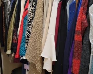 Lots of womens clothing from Chico's and a lot of pieces with the tag still on them.