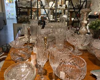 Crystals, glass serving dishes, candle holders
