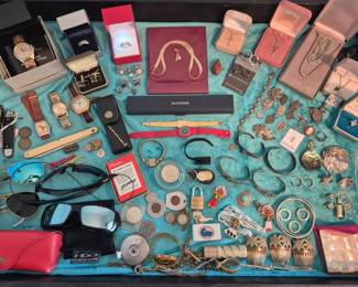 Never have I had such a full case! This is only one of five!  In this case we have 18K, 14K, and 10K. Beautiful Sterling Silver, Mother of Pearl, Abalone, and Turquoise. There is a mens Hamilton and Bulova 23 jewel watch and a womens Bucherer.  We have Ray Ban, Dooney & Bourke and Zippo among other great items.