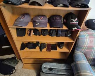 Hats, holsters. and Harley bag.