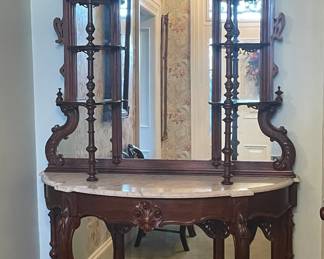 Ornate Marble Top mirrored Back Etagere’