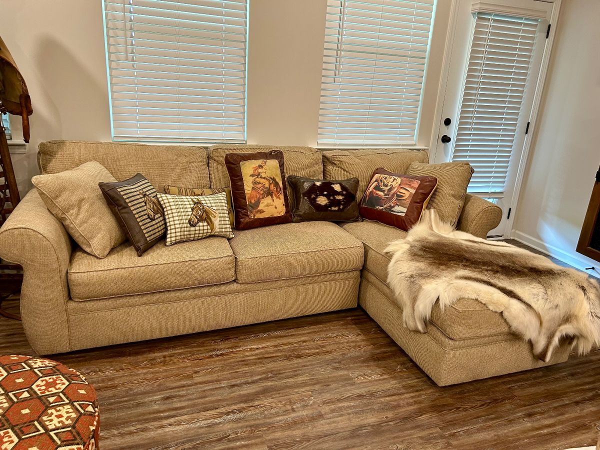 This neutral-toned Broyhill sectional sofa offers both style and comfort, perfect for a cozy living room or den. Upholstered in a durable beige fabric, it features deep cushions, wide arms, and a right-side chaise lounge for ultimate relaxation.

Condition: Excellent, gently used with no rips, stains, or sagging. From a smoke-free home.

Dimensions: Approx. 8 ft wide x 3.5 ft deep (chaise 6 ft deep).