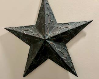 Embossed Metal Western Star Wall Art
Classic embossed metal five-point star with scrolling floral detail and a patinated dark finish. A staple of western, rustic, and farmhouse décor, this piece makes a bold wall accent indoors or outdoors.

Condition: Excellent, ready to hang.

Dimensions: Approx. 24” diameter