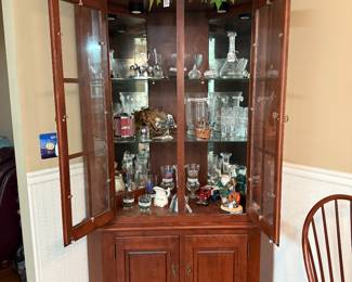 Curio cabinet with crystal items