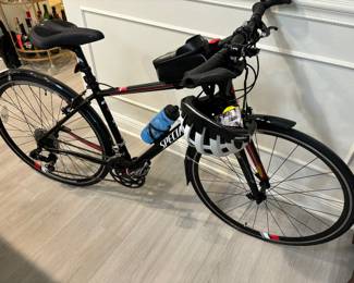 Specialized Bike in excellent condition.  
Brand new helmet.