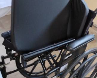 Wheel chair with extra padded cushion 