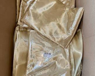 Gold tablecloths, some new in package.